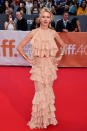 <p>At the premiere of “Demolition,” her new film with Jake Gyllenhaal, Naomi Watts wore a nude Balmain dress. Ruffles cascaded from the halter neck to the hemline and the light peach, almost nude color surprisingly didn’t drown out the pale-skinned Aussie actress. With her hair pulled back in a messy up-do and a dark red statement lip, Watts was frilly vision.</p>