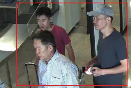 North Korean suspects Ri Jae Nam (front L), Hong Song Hac (back L) and Ri Ji Hyun (R). South Korean and U.S. officials have said they believe North Korean agents assassinated Kim Jong Nam, who had been living in the Chinese territory of Macau under Beijing's protection. Royal Malaysia Police