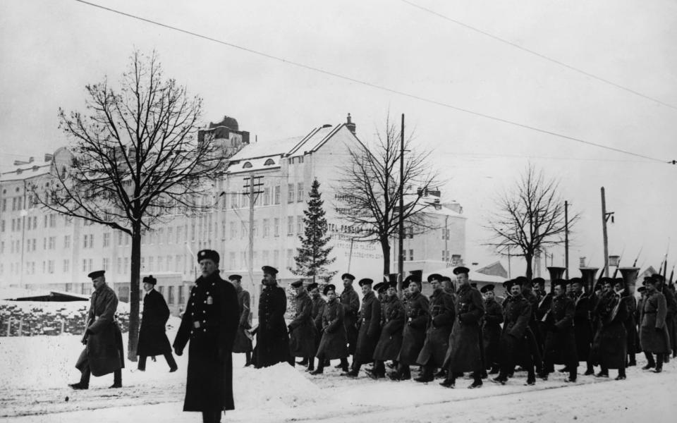 Russian troops marching through Finland during the Winter War in 1939 - Hulton Deutsch/Corbis Historical