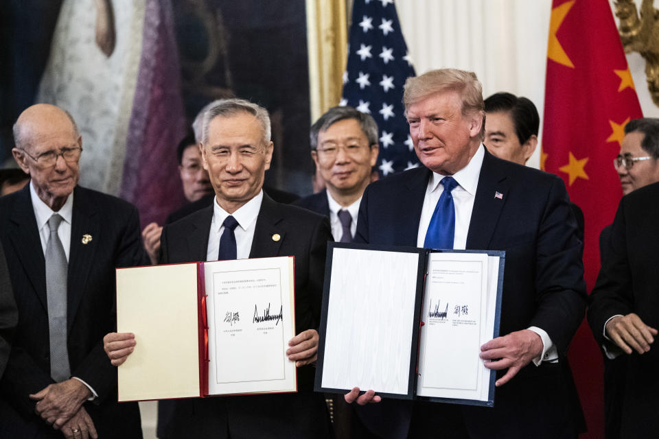 WASHINGTON, DC - JANUARY 15 : President Donald J. Trump signs a trade agreement with Chinese Vice Premier of the People's Republic of China, Liu He in the East Room at the White House on Wednesday, Jan 15, 2020 in Washington, DC. (Photo by Jabin Botsford/The Washington Post via Getty Images)