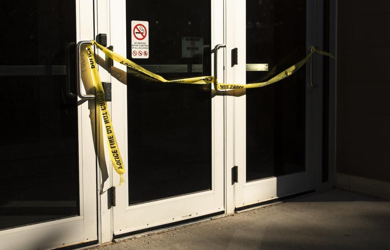 Police tape on a door following a stabbing at the University of Waterloo on June 28,. Waterloo Regional Police said three victims were stabbed inside the university's Hagey Hall, and the suspected attacker was arrested. THE CANADIAN PRESS/Nick Iwanyshyn