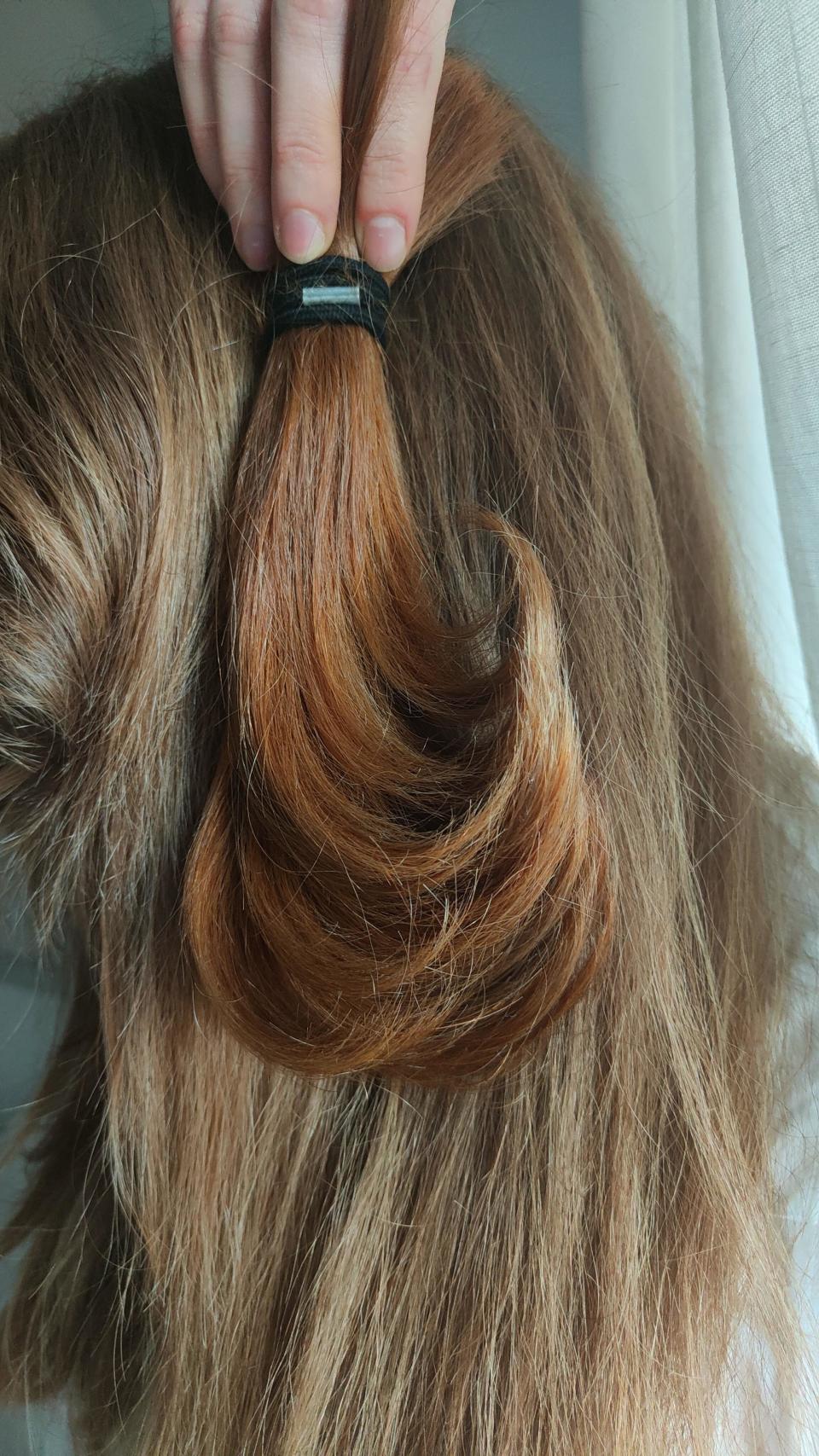 A dark patch of hair