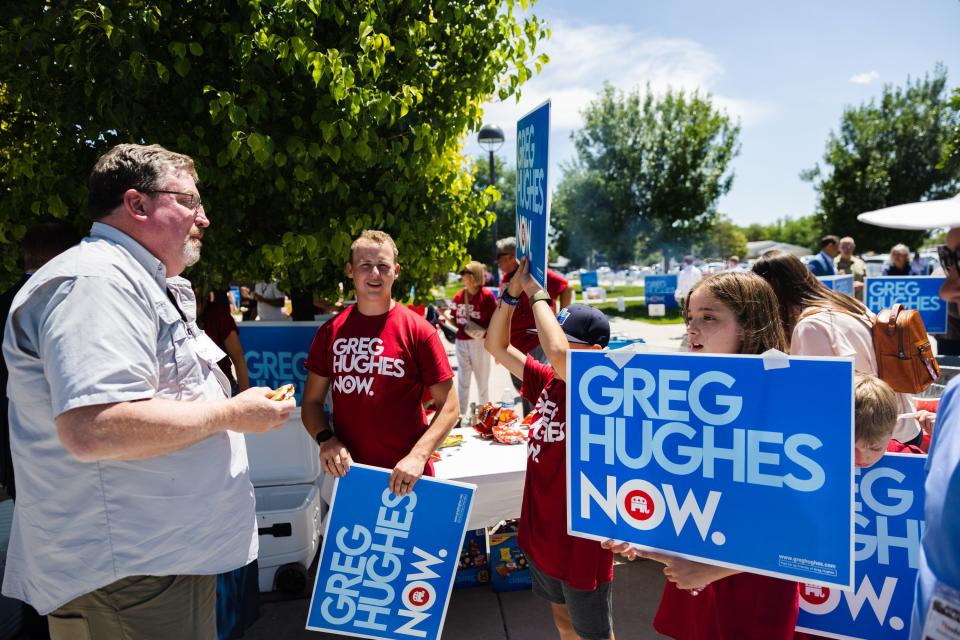 Supporters of Utah Congressional 2nd District candidate Greg Hughes speak with other delegates during the Utah Republican Party’s special election at Delta High School in Delta on June 24, 2023. | Ryan Sun, Deseret News
