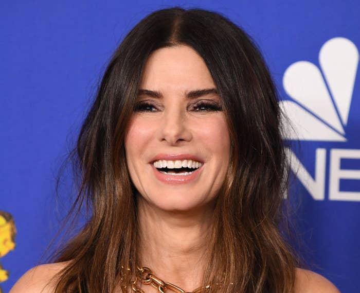 Bullock smiling at a red carpet event