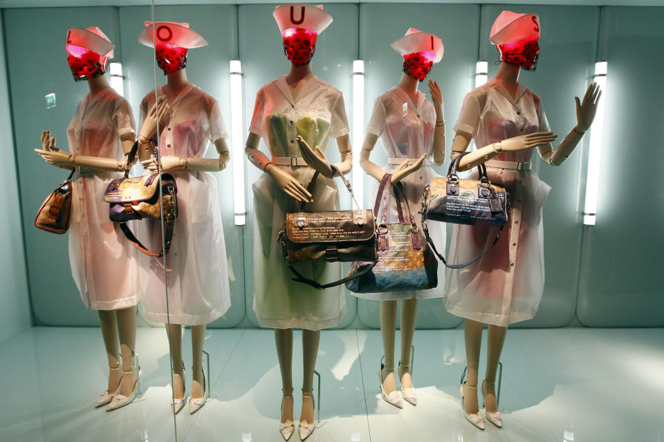 Fashion creations are displayed at the Louis Vuitton-Marc Jacobs exhibit in the Art Decoratifs Museum in Paris, Thursday, March 8, 2012. (AP Photo/Francois Mori)
