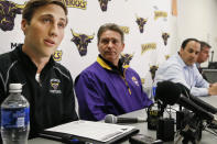 Minnesota State, Mankato defensive back Sam Thompson, left, reads a statement during a news conference as, from second from left, coach Todd Hoffener, associate coach Aaron Keen and athletic director Kevin Buisman listen Thursday, April 17, 2014, in Mankato, Minn. (AP Photo/Star Tribune, Jerry Holt) ST. PAUL OUT MINNEAPOLIS-AREA TV OUT MAGS OUT