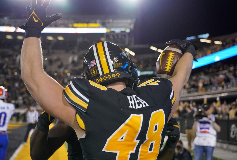 Nov 20, 2021; Columbia, Missouri, USA; Missouri Tigers tight end Niko Hea (48) celebrates after scoring against the Florida Gators during the first half at Faurot Field at Memorial Stadium. Mandatory Credit: Denny Medley-USA TODAY Sports