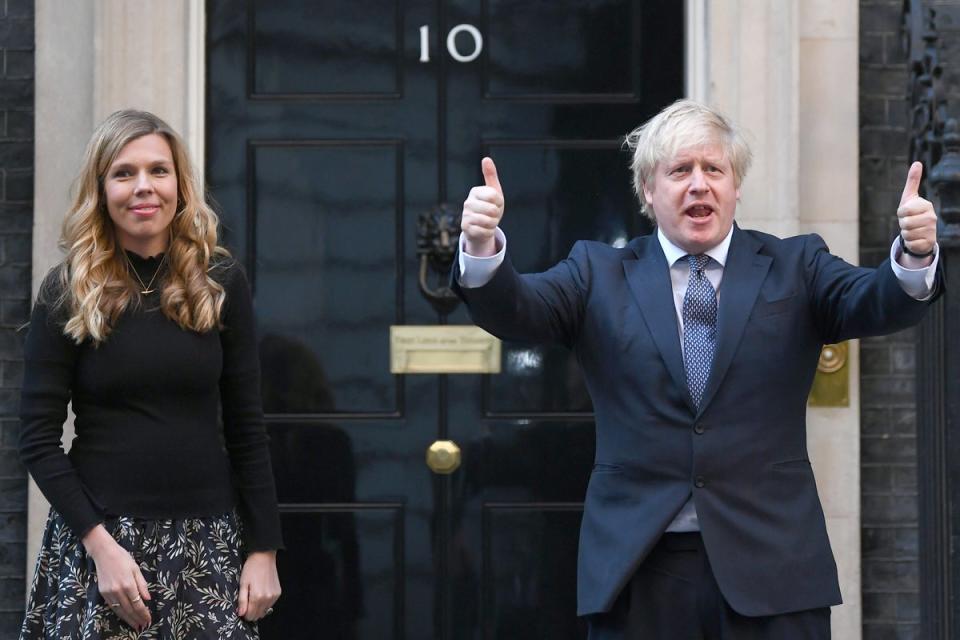 Prime Minister Boris Johnson and his wife Carrie stand in Downing Street (Victoria Jones/PA) (PA Wire)