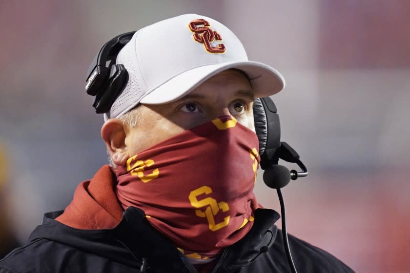 Southern California head coach Clay Helton looks on in the first half during an NCAA college football game against Utah, Saturday, Nov. 21, 2020, in Salt Lake City. (AP Photo/Rick Bowmer)