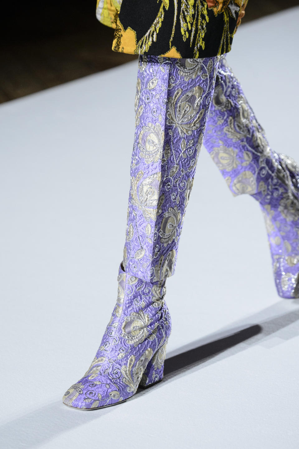 <p><i>Metallic purple embroidered boots from the SS18 Dries Van Noten collection. (Photo: ImaxTree) </i></p>