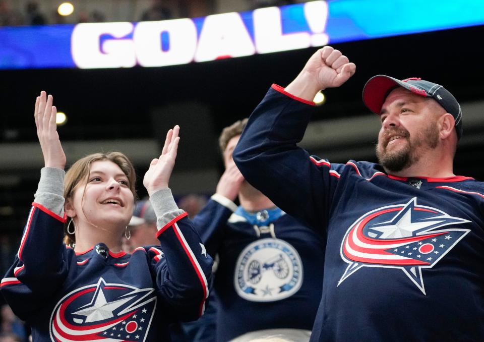 Mon., Apr. 4, 2022; Columbus, Ohio, USA; Columbus Blue Jackets fans cheer after a high-sticking penalty on the Blue Jackets was overturned on video review during the second period of a NHL game between the Columbus Blue Jackets and the Boston Bruins at Nationwide Arena. Mandatory Credit: Joshua A. Bickel/Columbus Dispatch