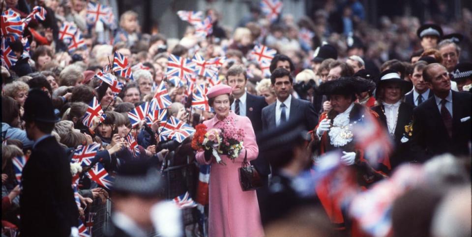 <div class="inline-image__caption"><p>The Queen And Prince Philip On Walkabout. </p></div> <div class="inline-image__credit">Tim Graham Photo Library via Getty Images</div>