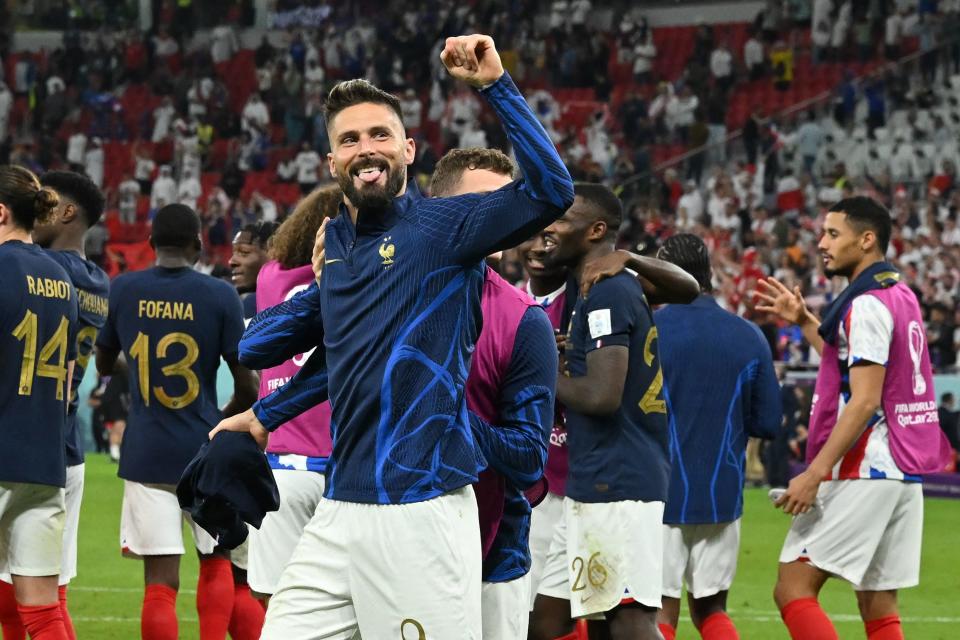 Seen here, Olivier Giroud salutes supporters after France's World Cup round of 16 victory over Poland in Qatar. 