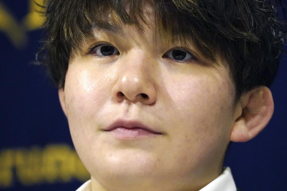Rina Gonoi, former member of the Japan Ground Self-Defense Forces, attends the press conference at the Foreign Correspondents' Club of Japan, Wednesday, Dec. 13, 2023, in Tokyo. A Japanese court on Tuesday convicted three former soldiers in a sexual assault case that authorities had dropped until Gonoi, the victim, came forward demanding a reinvestigation and prompting a military-wide harassment probe. (AP Photo/Eugene Hoshiko)