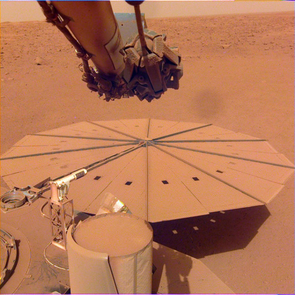 Dust coats one of the InSight lander's two solar arrays. / Credit: NASA