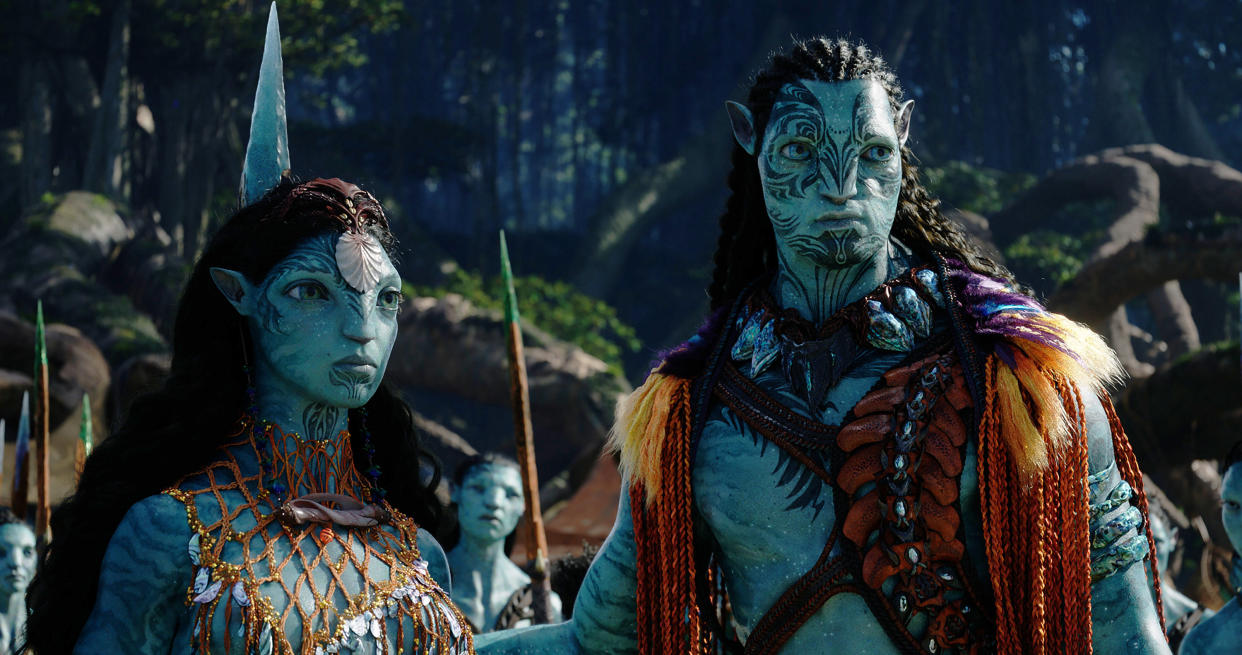 This image released by 20th Century Studios shows Kate Winslet, as Ronal, left, and Cliff Curtis, as Tonowari, in a scene from "Avatar: The Way of Water." (20th Century Studios via AP)
