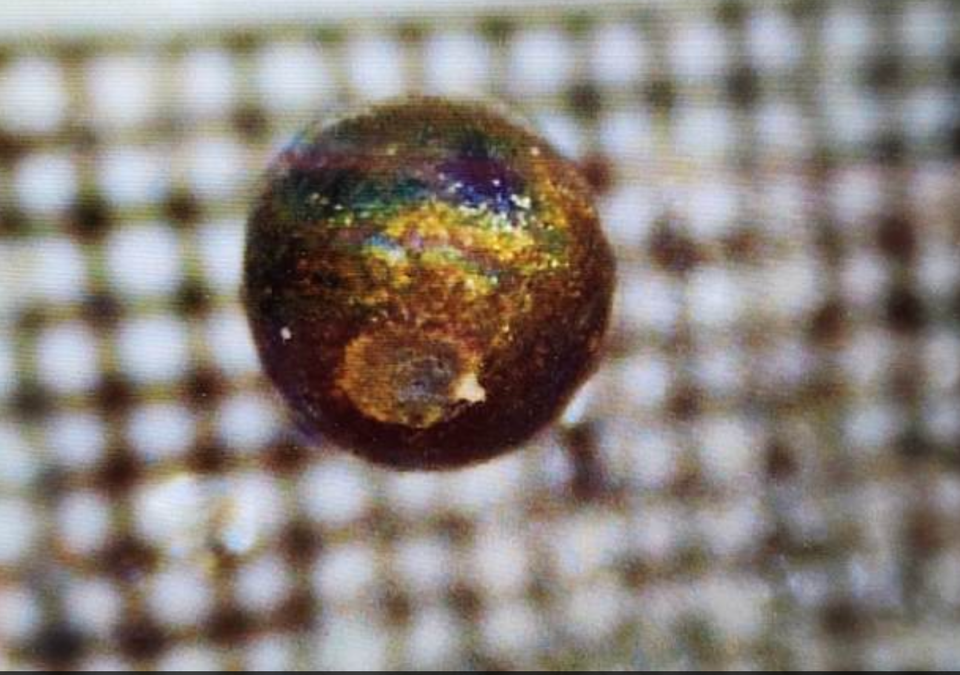 A tiny spherule, recovered from the bottom of the Pacific Ocean, could be a fragment from an alien spacecraft, Harvard Professor Avi Loeb says (Courtesy of Avi Loeb)