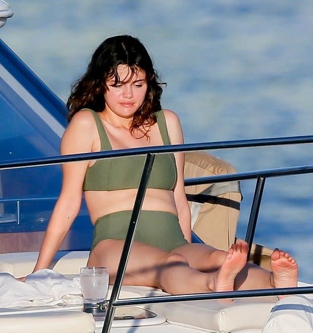 Selena Gomez sunbathes on a yacht