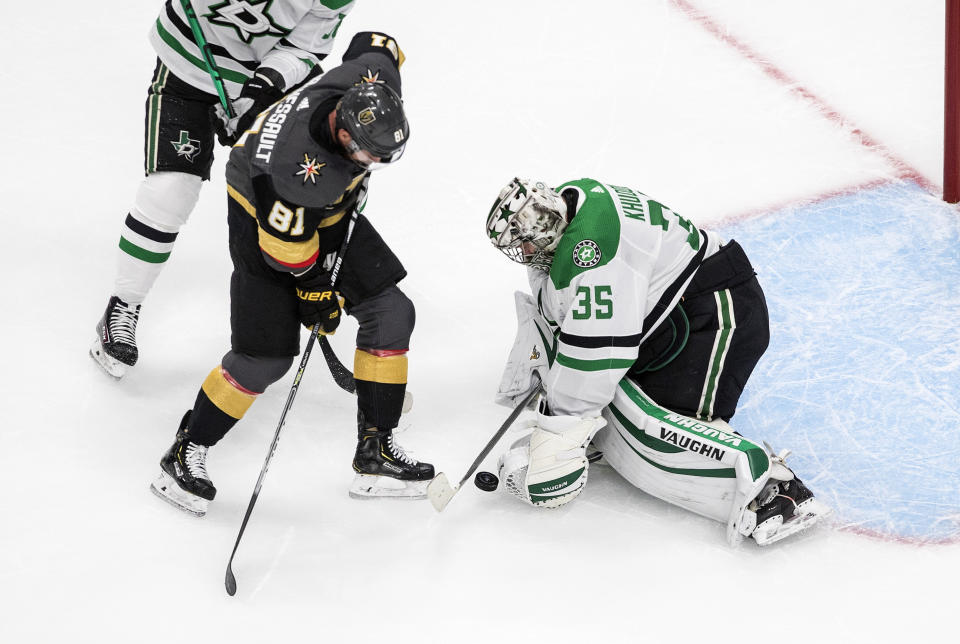 Vegas Golden Knights' Jonathan Marchessault (81) is stopped by Dallas Stars' goalie Anton Khudobin (35) during the first period of Game 1 of an NHL Western Conference final hockey game, Sunday, Sept. 6, 2020 in Edmonton, Alberta. (Jason Franson/The Canadian Press via AP)