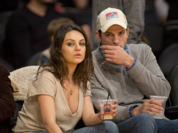 <p>IMAGO / ZUMA Wire</p><p>Actors Kutcher and Kunis played a couple on-screen in <em>That ‘70s Show </em>long before any real-life romance. Nearly 15 years later, in 2012, they reconnected at the Golden Globe Awards and started dating. </p><p>In a podcast episode with Marc Maron, Kunis talked about the reunion: “I was looking around, and there was a really beautiful man from the back. I was literally like, 'Oh, he's kinda hot' … and then he turned around, and I was like, 'Oh my god, it's Kutch.'”</p><p>They married in 2015 and have two children.</p>