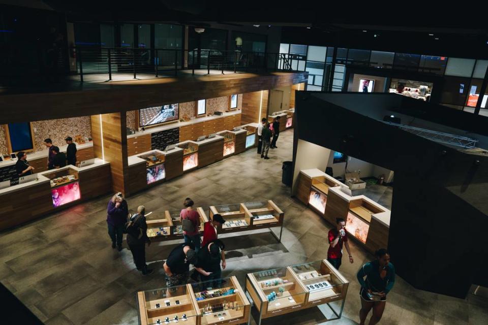 A top-down view of dried cannabis case lines in the Planet 13 SuperStore.