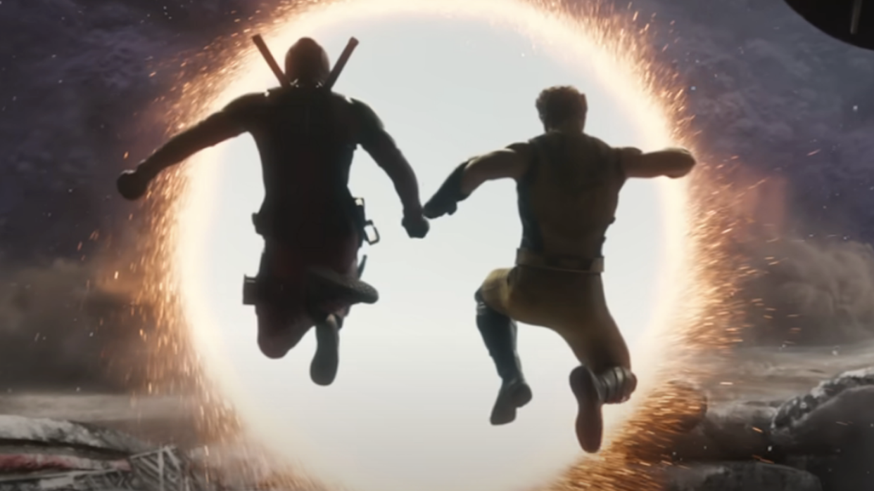  Deadpool and Wolverine make the portal jump. 