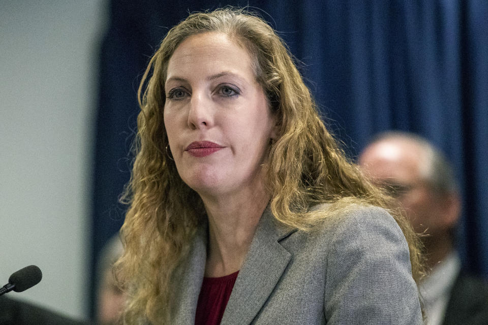 Jennifer Arbittier Williams, assistant United States Attorney with the Criminal Division of the U.S. Attorney's Office in Philadelphia, speaks during a press conference on the indictment of Local 98 leader John "Johnny Doc" Dougherty at the U.S. Attorney's office in Center City Philadelphia on Wednesday, Jan. 30, 2019. Dougherty, a powerful union boss who has long held a tight grip on construction jobs in the Philadelphia region and wielded political power in the city and Statehouse, was indicted on embezzlement and fraud charges along with a city councilman and six others. (Heather Khalifa/The Philadelphia Inquirer via AP)