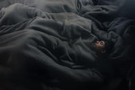 <p>Lives In limbo: Young Afghans sleep in an abandoned train wagon in Belgrade, Serbia, Jan. 12, 2017.<br>The tightening of the so-called Balkan route into the European Union stranded thousands of refugees attempting to travel through Serbia to seek a new life in Europe. Many spent the freezing winter in derelict warehouses behind Belgrade’s main train station. The UNHCR reported that the number of refugees in Serbia had increased from 2,000 in June 2016 to more than 7,000 by the end of the year. Some 85 percent were accommodated in government facilities, most of the others slept rough in the capital. (Photo: Francesco Pistilli) </p>