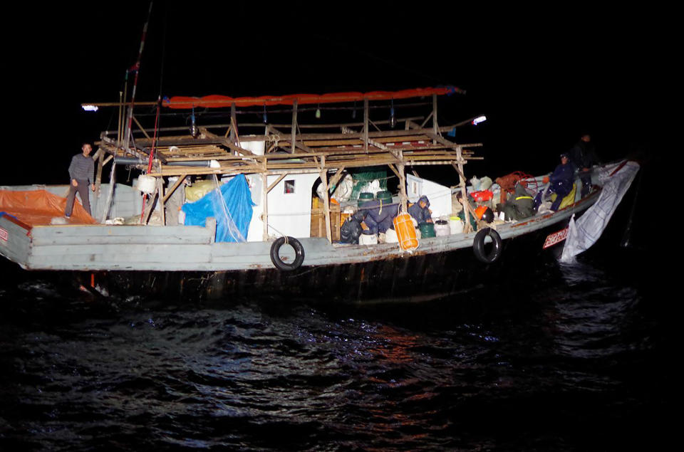 This late May, 2019, photo provided by Japan Coast Guard shows a North Korean fishing boat in the waters near Yamatotai, Japan. Japanese Coast Guard says its patrol boats have been pushing back hundreds of North Korean poachers swarming toward fishing grounds off Japan’s northern coast.(Japan Coast Guard via AP)