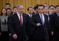 Israeli Prime Minister Benjamin Netanyahu (L) and China's Premier Li Keqiang attend a welcoming ceremony at the Great Hall of the People in Beijing, China March 20, 2017. REUTERS/Jason Lee