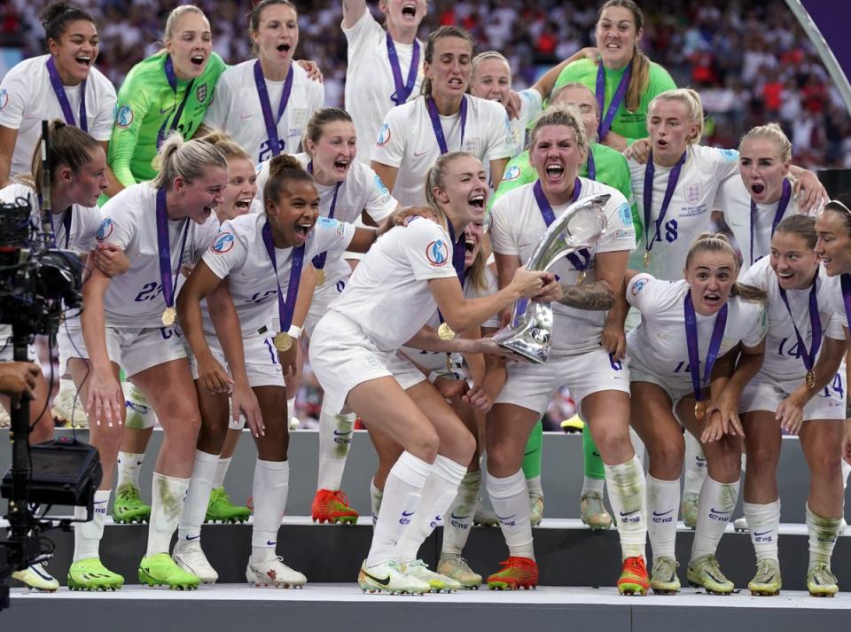 England’s Leah Williamson and Millie Bright celebrate with the trophy after then Euro 2022 final (Danny Lawson/PA) (PA Wire)