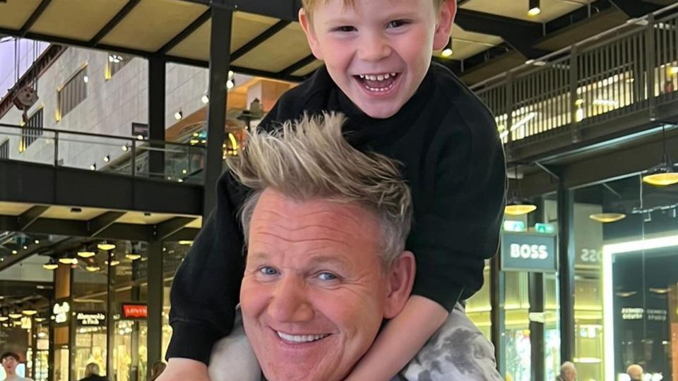 Gordon with his son Oscar on his shoulders