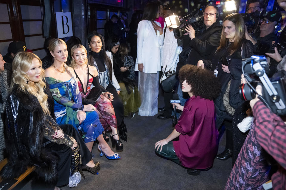 Rachel Zoe, from left, Nicky Hilton Rothschild, Tina Craig and Kimora Lee Simmons attend the Prabal Gurung Fall/Winter 2023 fashion show at Gotham Hall on Friday, Feb. 10, 2023, in New York. (Photo by Charles Sykes/Invision/AP)