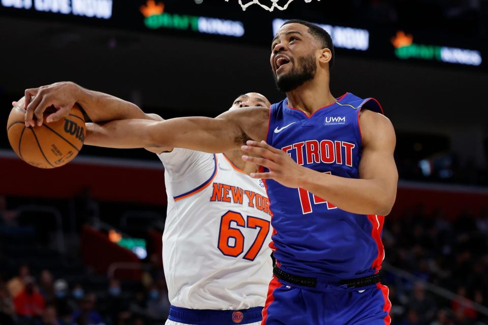 Knicks forward Taj Gibson blocks a shot by Pistons guard Cassius Stanley in the second half of the Pistons' 94-85 loss on Wednesday, Dec. 29, 2021, at Little Caesars Arena.