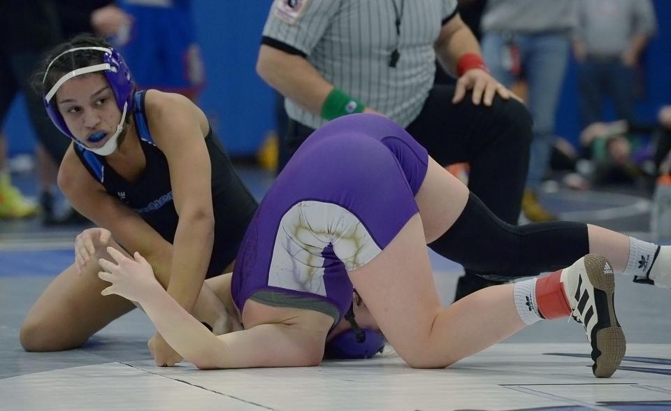 Boonsboro's Amelia Mikus pins Smithsburg's Allie Grossnickle in the second period for the girls 135-pound title.