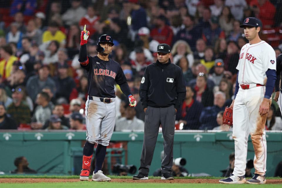 Guardians second baseman Andres Gimenez celebrates after hitting an RBI single during the ninth inning against the Red Sox at Fenway Park, April 16, 2024, in Boston.