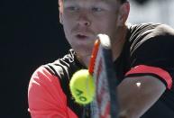 Tennis - Australian Open - Quarterfinals - Rod Laver Arena, Melbourne, Australia, January 23, 2018. Kyle Edmund of Britain hits a shot against Grigor Dimitrov of Bulgaria. REUTERS/Thomas Peter