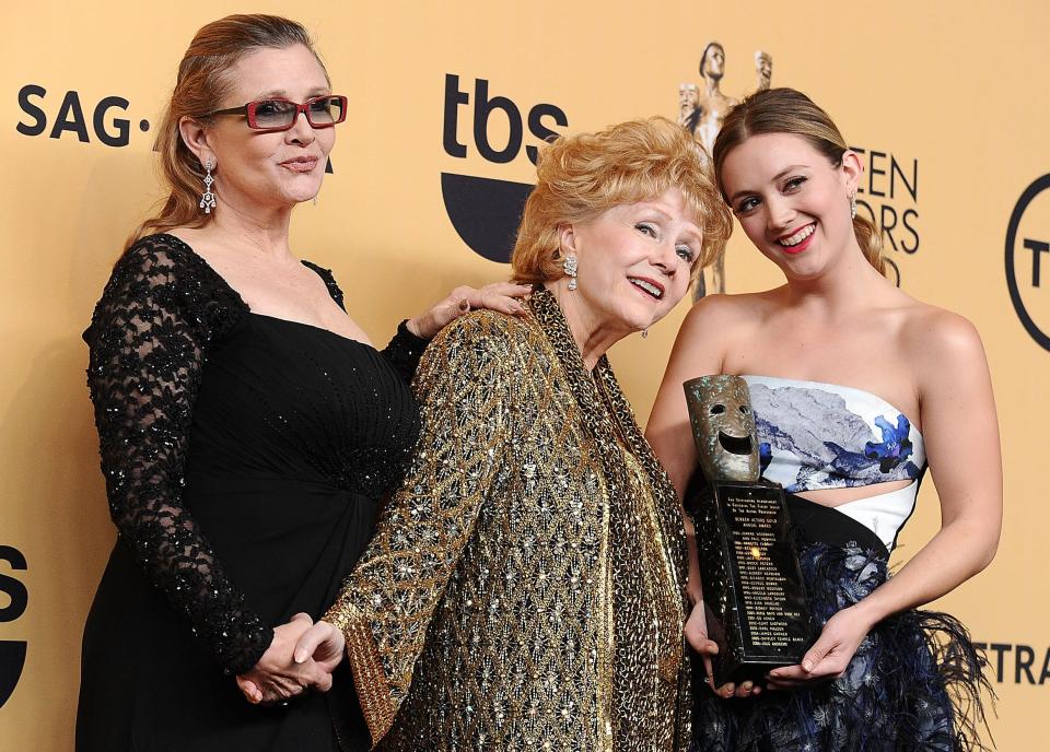 Actress Debbie Reynolds, actress Carrie Fisher and Billie Lourd pose in the press room at the 21st annual Screen Actors Guild Awards at The Shrine Auditorium on January 25, 2015 in Los Angeles, California