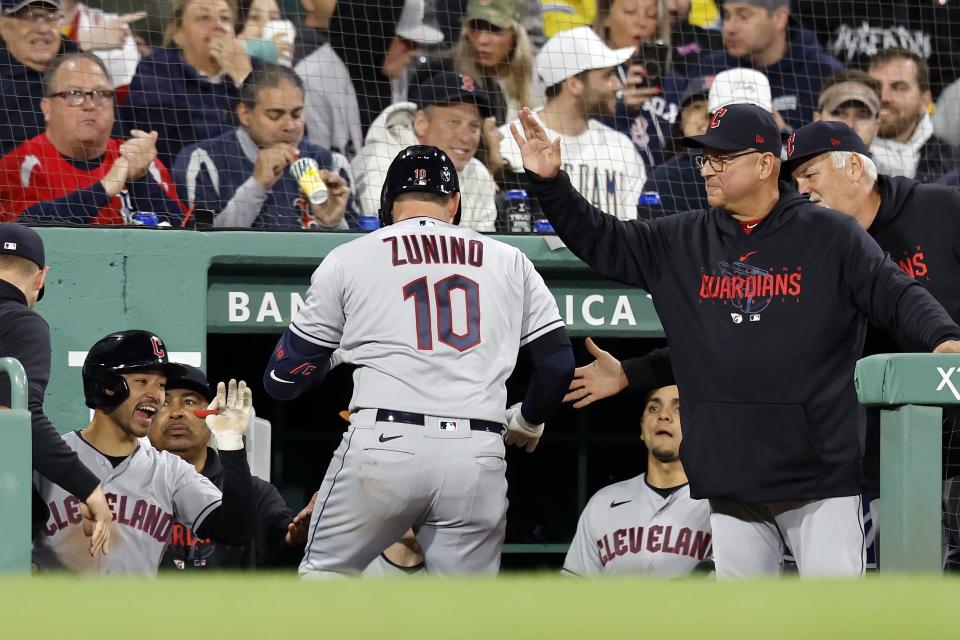 Cleveland Guardians' Mike Zunino (10) celebrates after his solo home run during the fourth inning of a baseball game against the Boston Red Sox, Friday, April 28, 2023, in Boston. (AP Photo/Michael Dwyer)