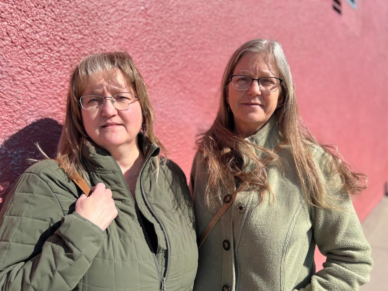 Michelle Pearce, left, and Melanie Pearce are the owners of the Whitehorse Star newspaper. They say their decision to shut down the paper for good next month is final, and the business is not for sale. (George Maratos/CBC  - image credit)