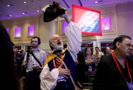 <p>Dressed in Revolutionary War attire, Tea Party supporter William Temple reacts during the Conservative Political Action Conference (CPAC) in Oxen Hill, Md., Feb. 22, 2018. (Photo: Kevin Lamarque/Reuters) </p>