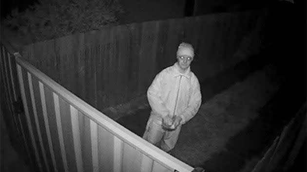 ACT Police have released CCTV of a Canberra man allegedly launching poison-laced mince into a backyard in what police believe was an attempted dog baiting. Photo: ACT Police
