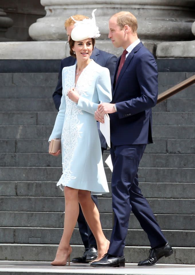 The Duchess of Cambridge in Catherine Walker, with husband Prince William and Prince Harry.