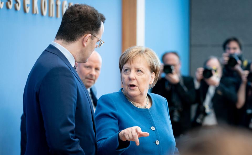 11 March 2020, Berlin: Chancellor Angela Merkel (CDU) and Jens Spahn (CDU), Federal Minister of Health, will hold a press conference on the development of the coronavirus. Photo: Kay Nietfeld/dpa (Photo by Kay Nietfeld/picture alliance via Getty Images)