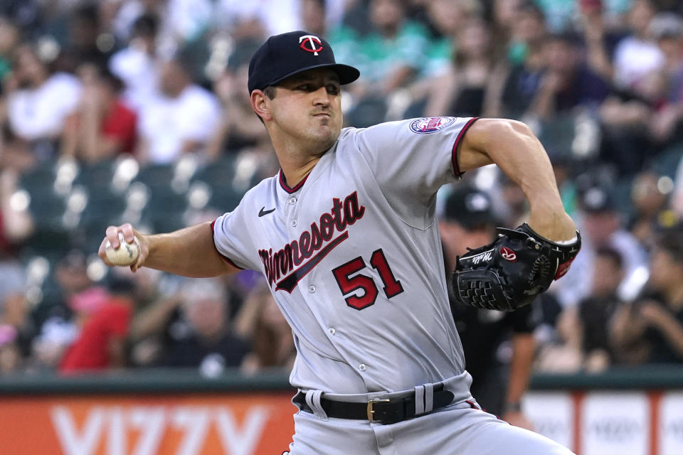 Minnesota Twins starting pitcher Tyler Mahle throws to a Chicago White Sox batter during the first inning of a baseball game in Chicago, Saturday, Sept. 3, 2022. (AP Photo/Nam Y. Huh)