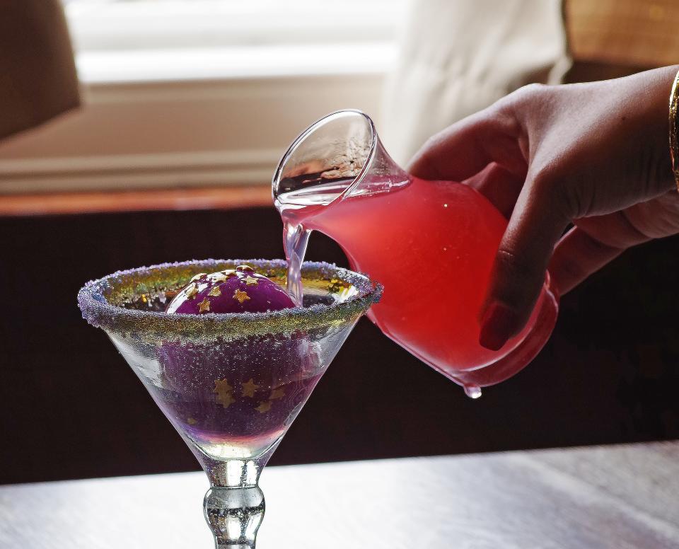 Cleopatra's Royal Gimlet is made of hibiscus-Infused Barr Hill Gin, house lavender honey, lemon juice and Butterfly Pea Ice Bomb. Yaz's Table, which serves up new American cuisine with an Egyptian twist, is located at 1209 Bedford St. Abington on Thursday, April 28, 2022.