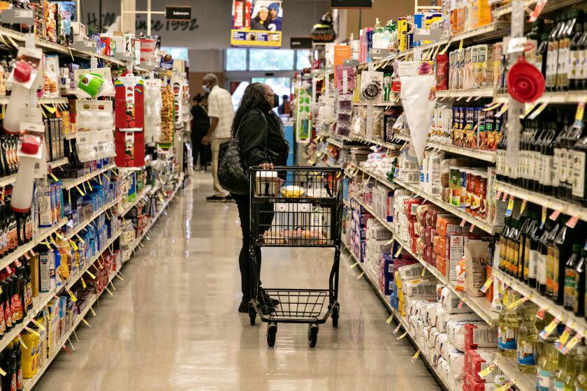 LOS ANGELES, CA - OCTOBER 14: A shopper visits Albertsons at 3901 Crenshaw Blvd on Friday, Oct. 14, 2022 in Los Angeles, CA. Kroger, that parent company of Ralphs, plans to buy Albertsons, parent company of Vons, in a deal valued at $24.6 billion, a merger that would combine the two largest grocery-store chains in the U.S. (Jason Armond / Los Angeles Times)