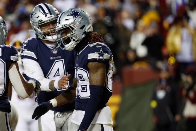 Cowboys look to break curse, record first playoff win in navy jerseys