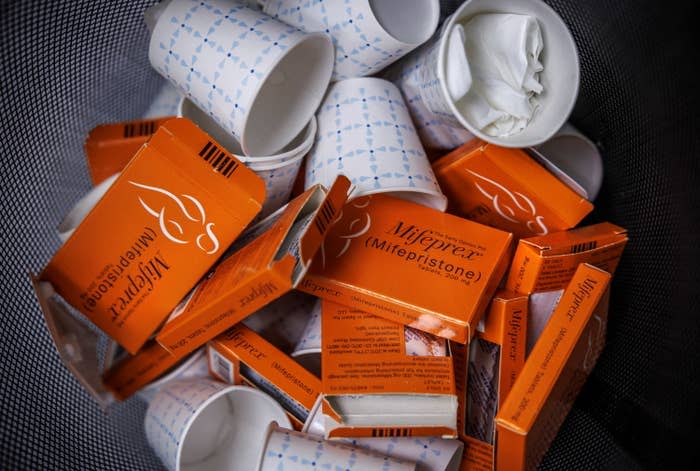 Used boxes of mifepristone pills, the first drug used in a medical abortion, fill a trash at Alamo Women’s Clinic in Albuquerque, New Mexico, January 11, 2023.