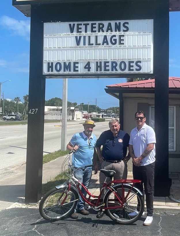Troy Blevins, Bill Dudley, and Andy, who donated the bikes to Home Again.